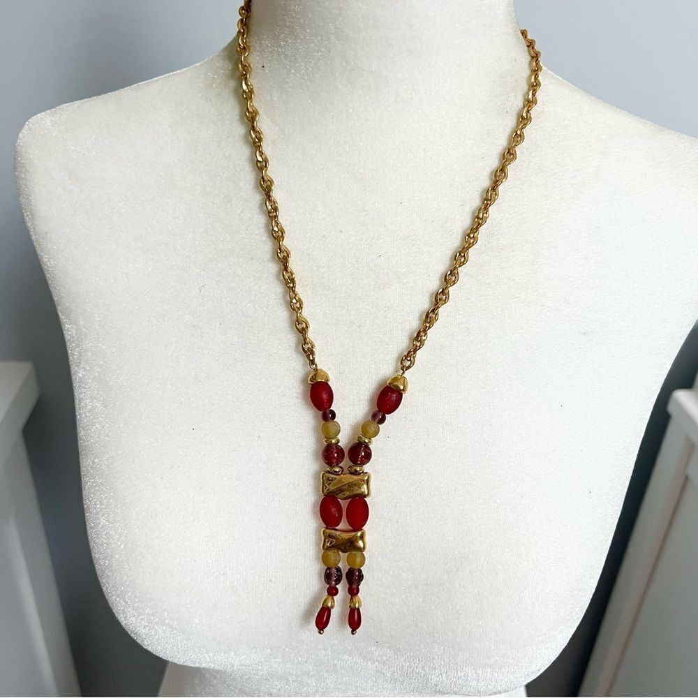 Double strand beaded statement necklace on a gold tone chain